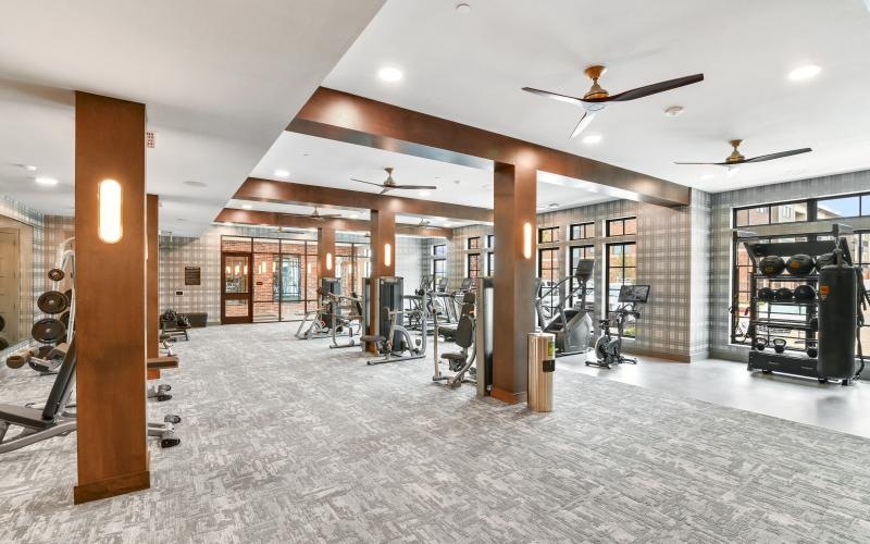 a gym with treadmills and treadmills